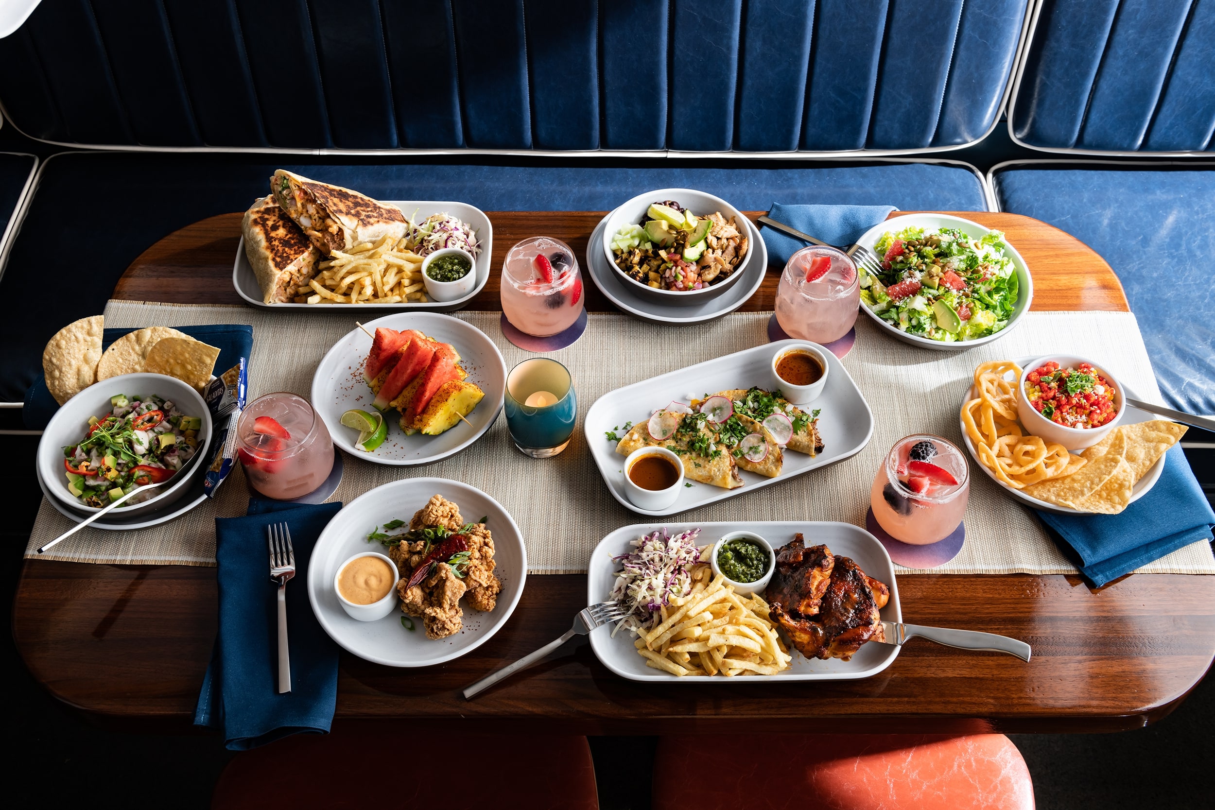 Food and drink spread at Suburban Yacht Club at The Boardwalk