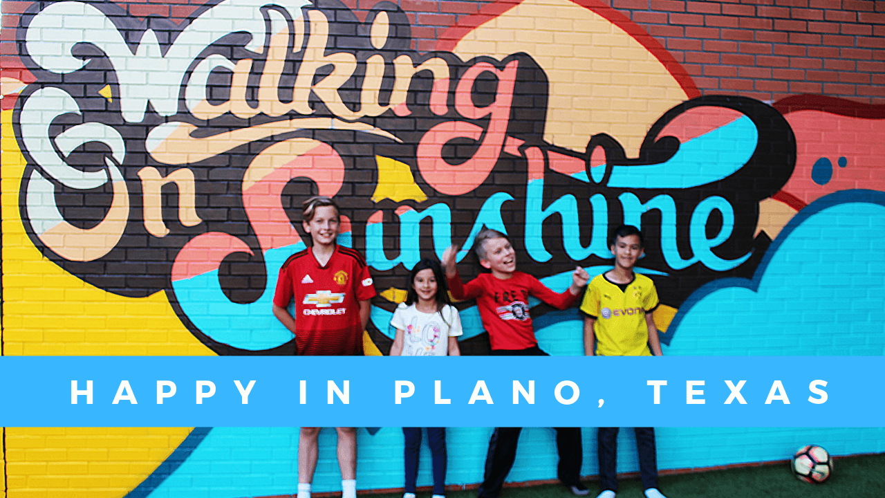 Happy in Plano kids in front of mural