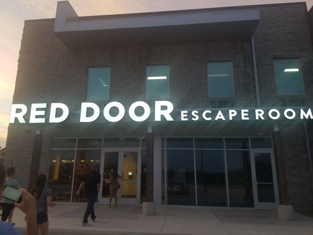 red door escape room confinement