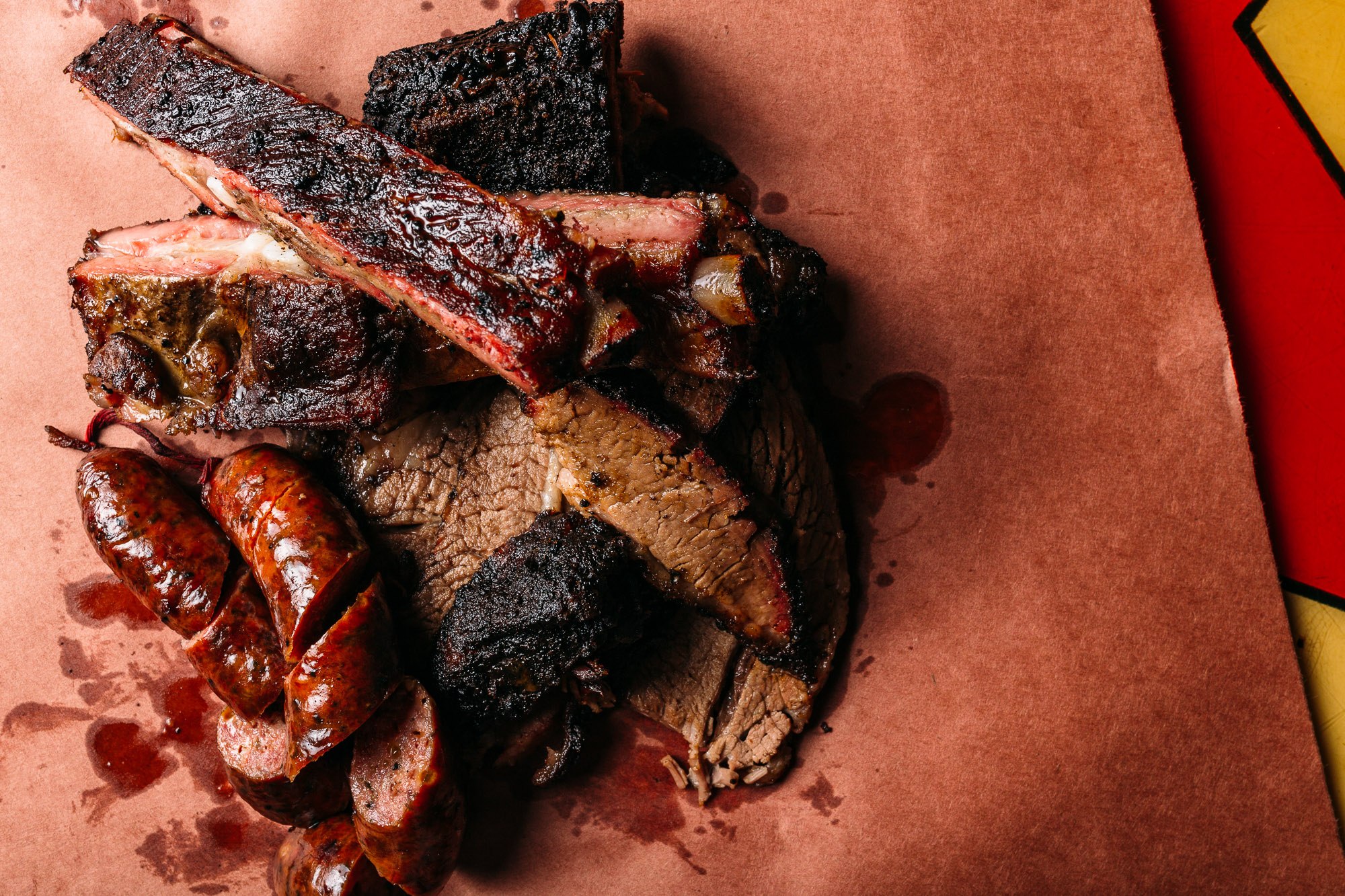 Barbecue meat on butcher paper from Lockhart Smokehouse