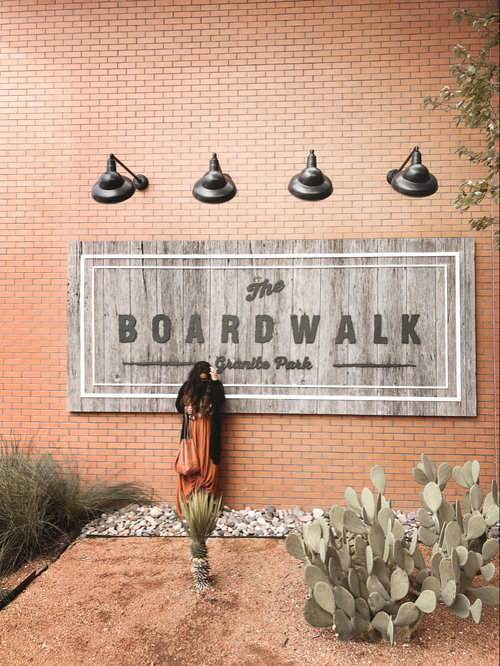 Samantha Ruble and The Boardwalk sign