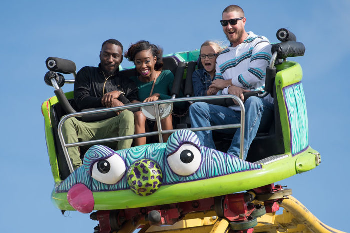 Family on roller coaster at State Fair