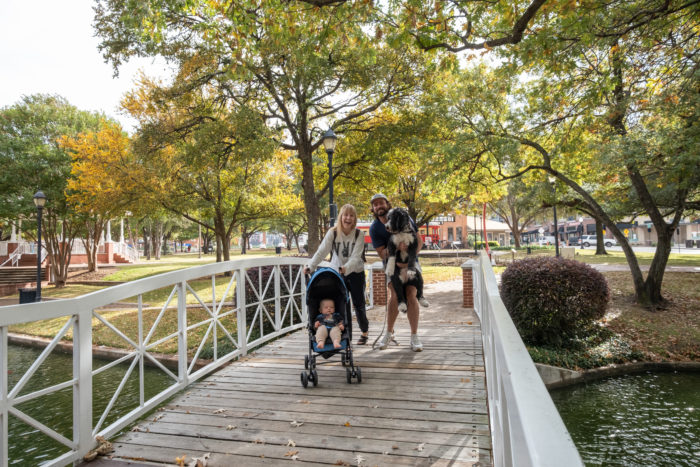 Traveling Newlyweds in Plano at Haggard Park with baby and pup