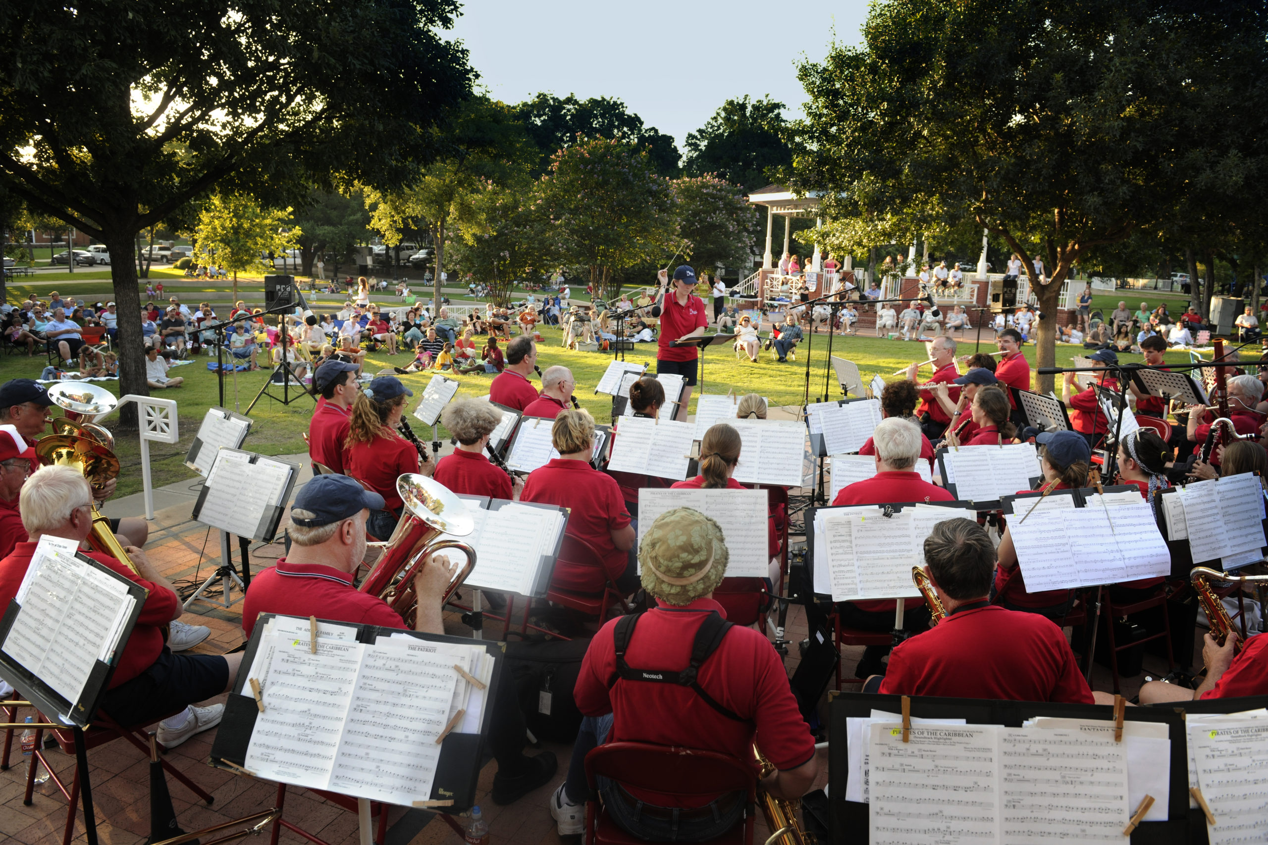Plano Community Band performing in Haggard Park during a Summer Concert Series