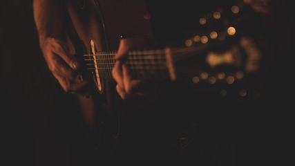 hands on guitar adobe stock photo
