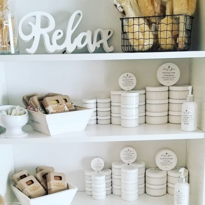 Sweet Home Bath & Body products from Downtown Plano store with a RELAX sign