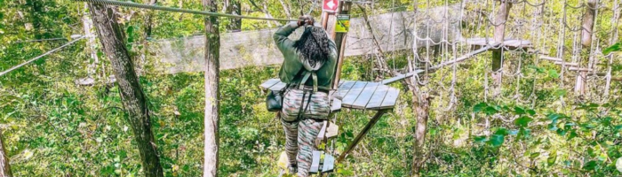 Laurin Curtis, with The Life of Jo Jo, having fun in the trees at Go Ape in Plano