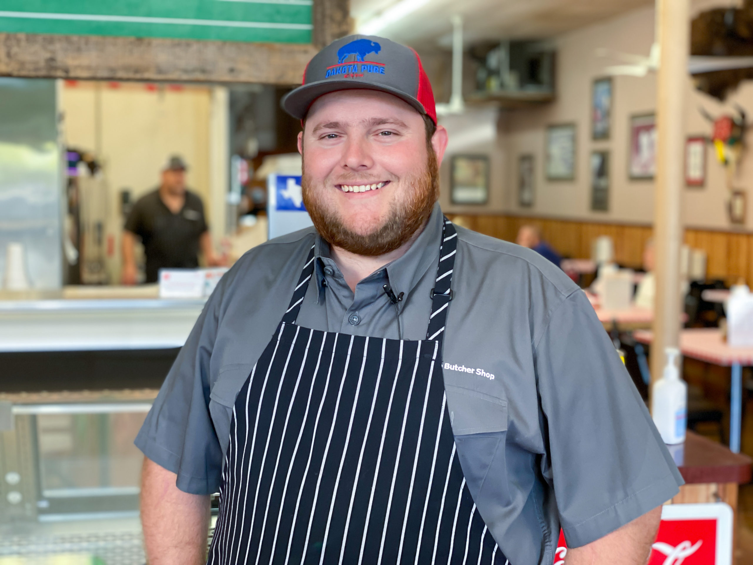 Ye Ole Butcher Shop in Plano, TX - headshot of owner's son, Joshua Sparks.