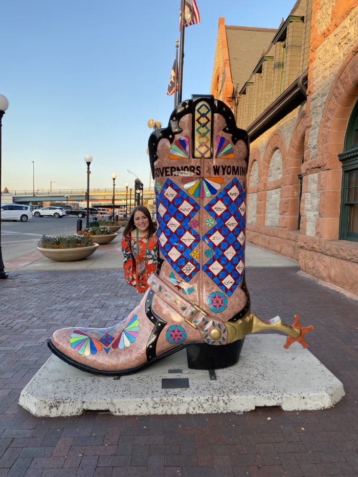 Marisa Obando with a big cowboy boot