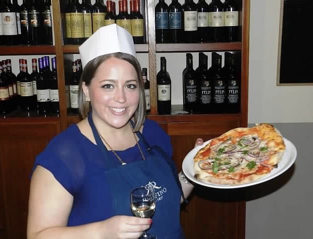 Marisa Obando in Italy with pizza & wine