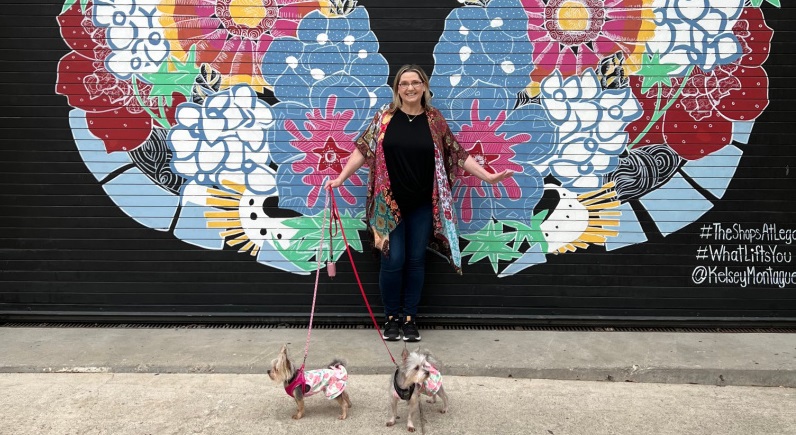 Mural in pet-friendly Plano with the blogger and her two dogs