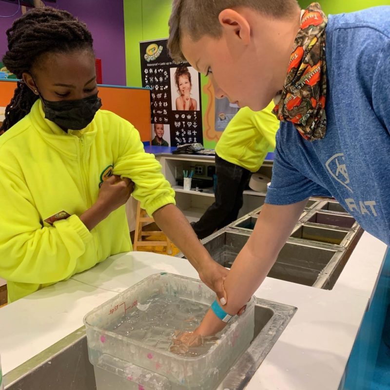 Kid exploring Crayola Experience in Plano, TX