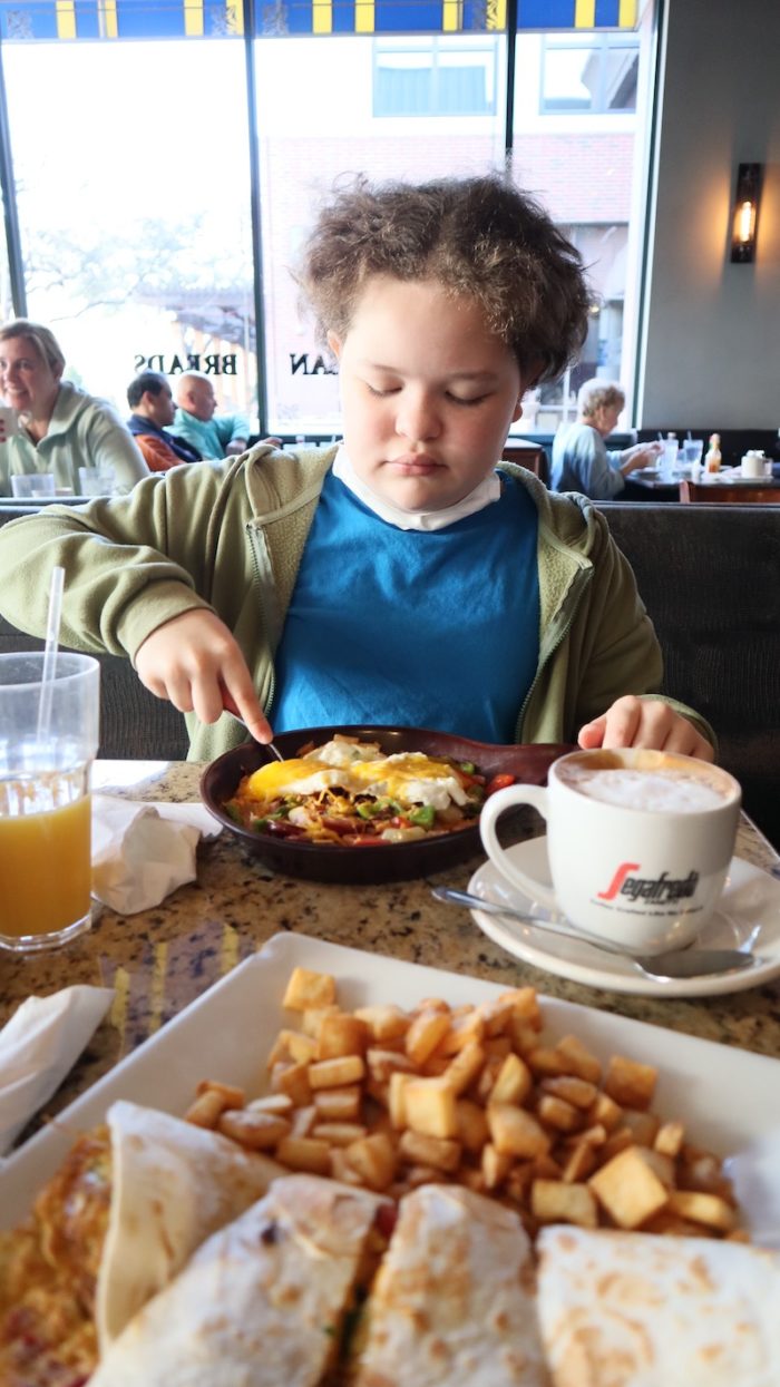 Rory's daughter eats breakfast in Plano at Main Street Bistro.