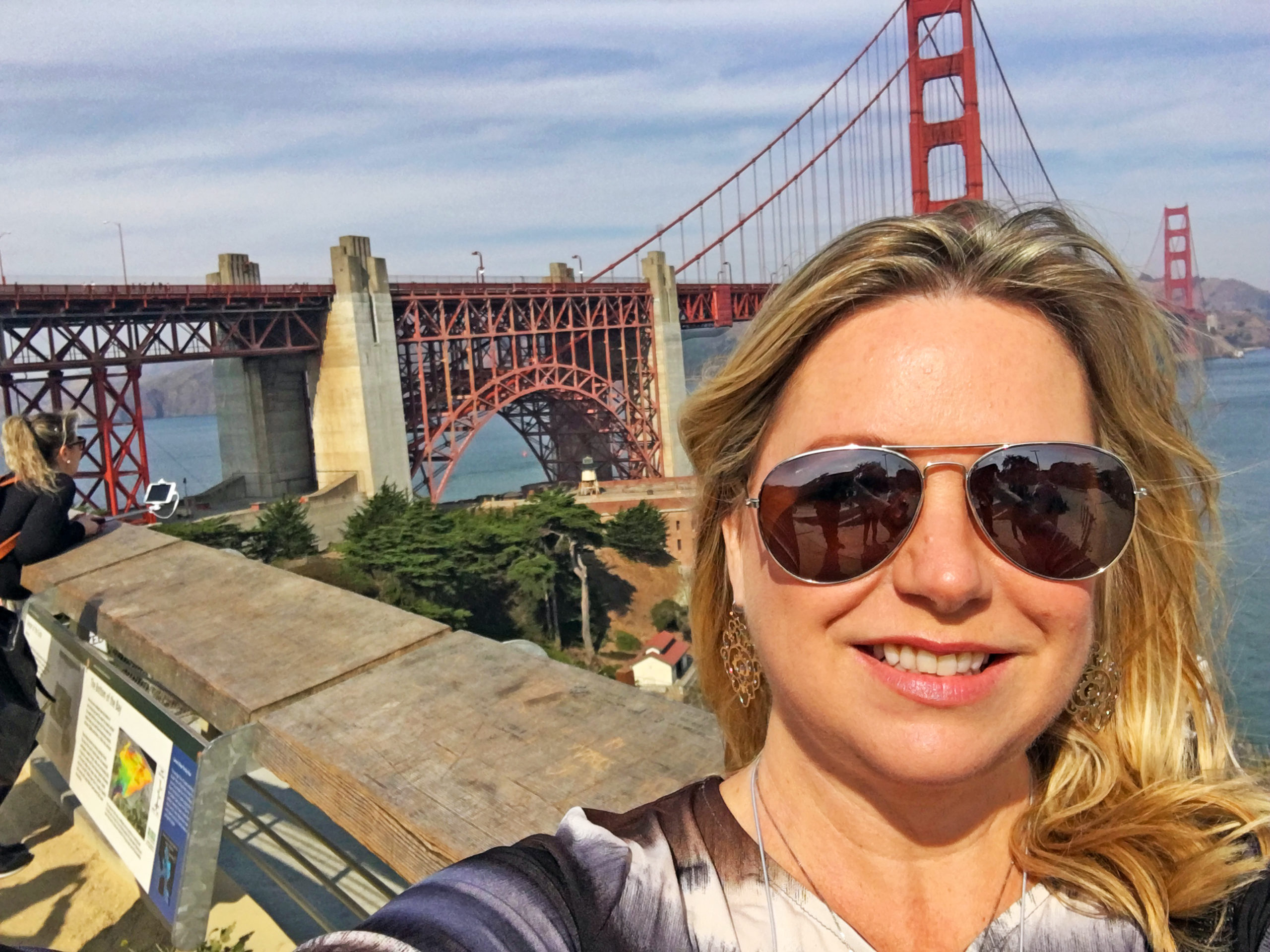 Stephanie in San Francisco in front of the Golden Gate Bridge