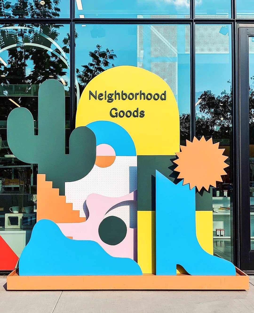 Neighborhood Goods window sign