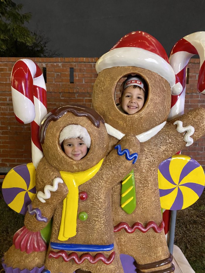 Boys posing in faceless gingerbread men