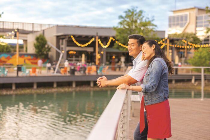 Couple overlooking water at The Boardwalk