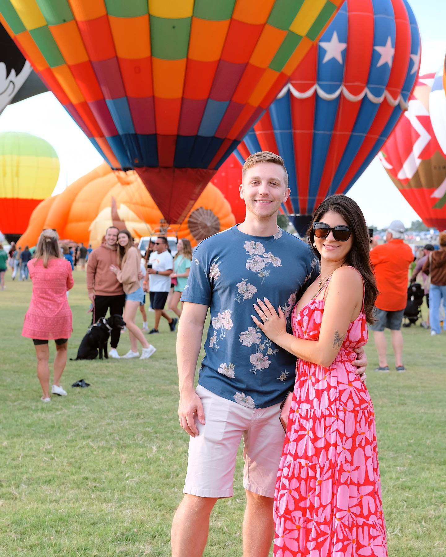 Couple enjoying the hot air balloons at the Plano Hot Air Balloon Festival
