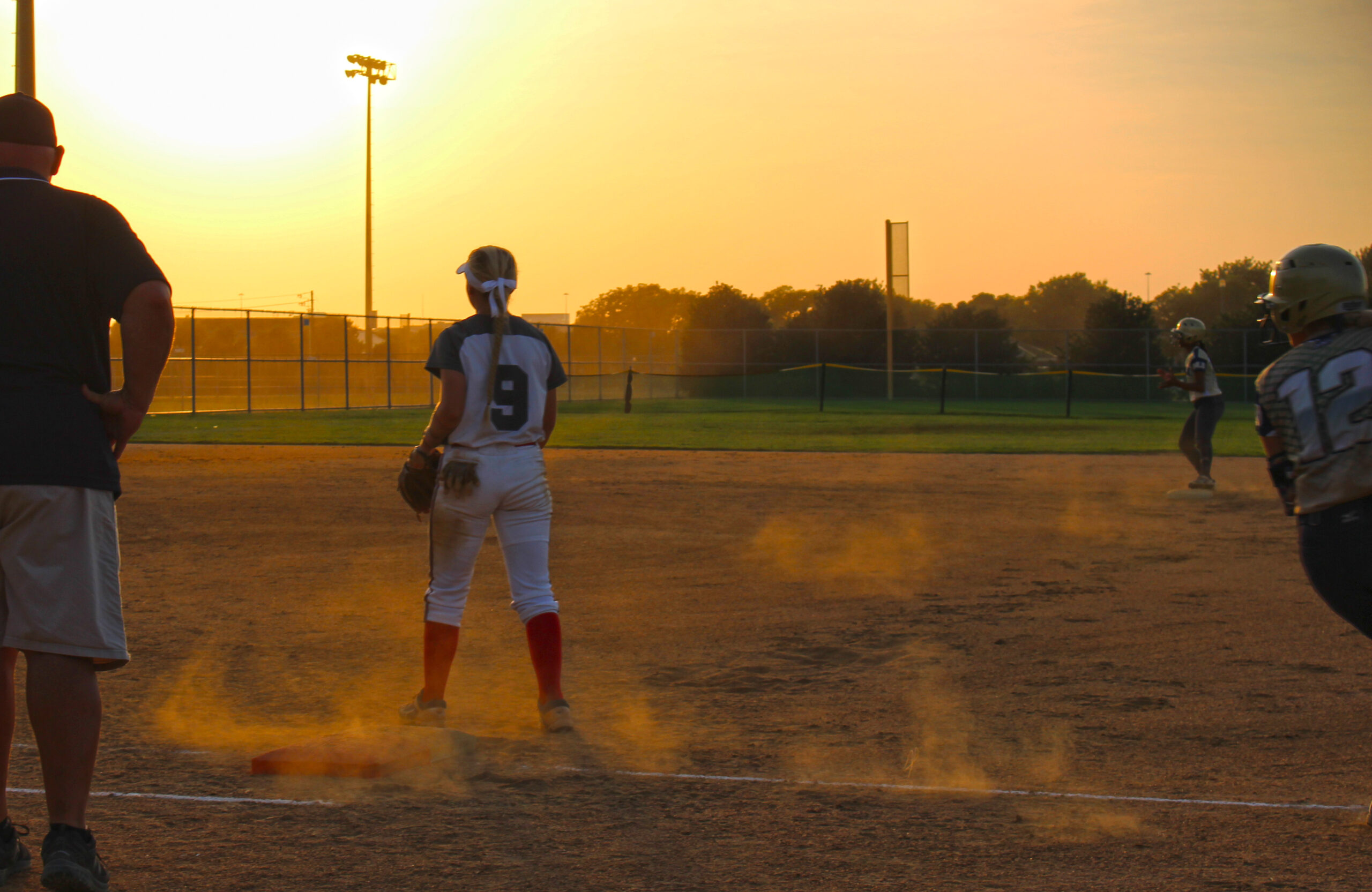 USA Softball sunset and dust