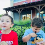 Two boys indulging in ice cream at Local Creamery featured article wins HSMAI Adrian Award