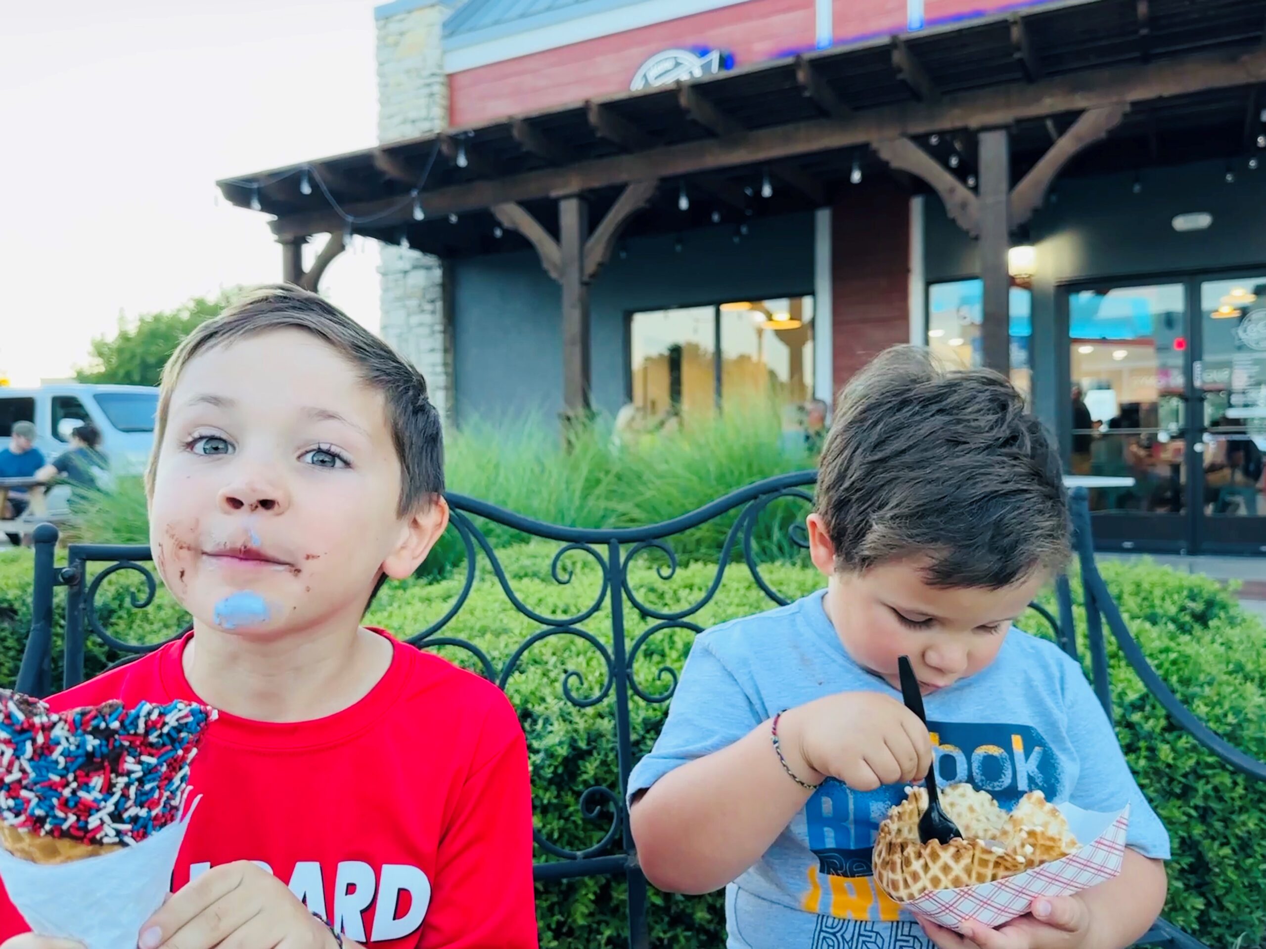 Two boys indulging in ice cream at Local Creamery featured article wins HSMAI Adrian Award