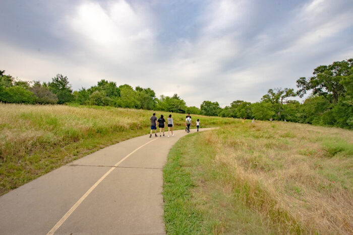 Arbor hills with family walking