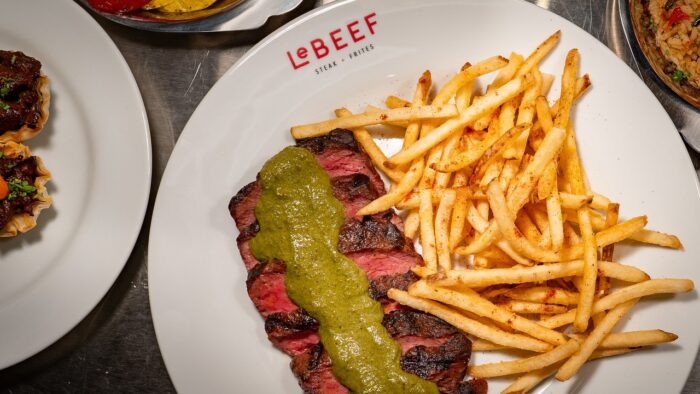 A plate of steak and fries.