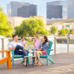 Family sitting in chairs on the Boardwalk